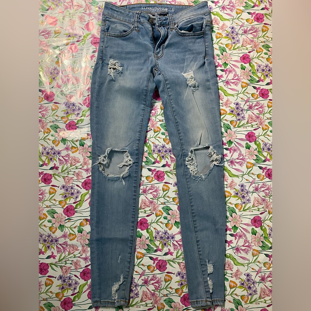 AE Super Super Stretch Destroyed Light Blue Jeggings - American Eagle